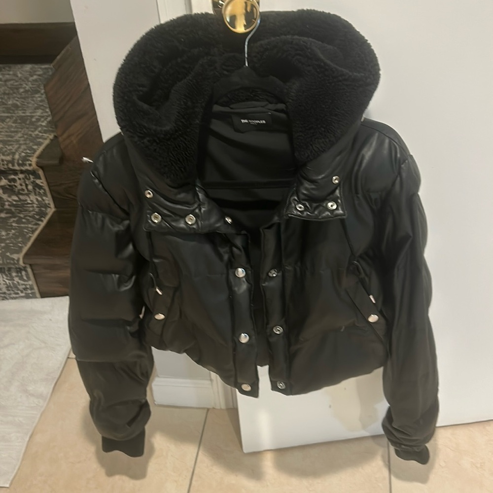 Brand new leathered puffer with a hood